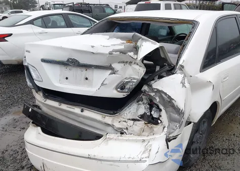 2000 Toyota Avalon Xl z USA, uszkodzony, nr VIN 4T1BF28B4YU047721